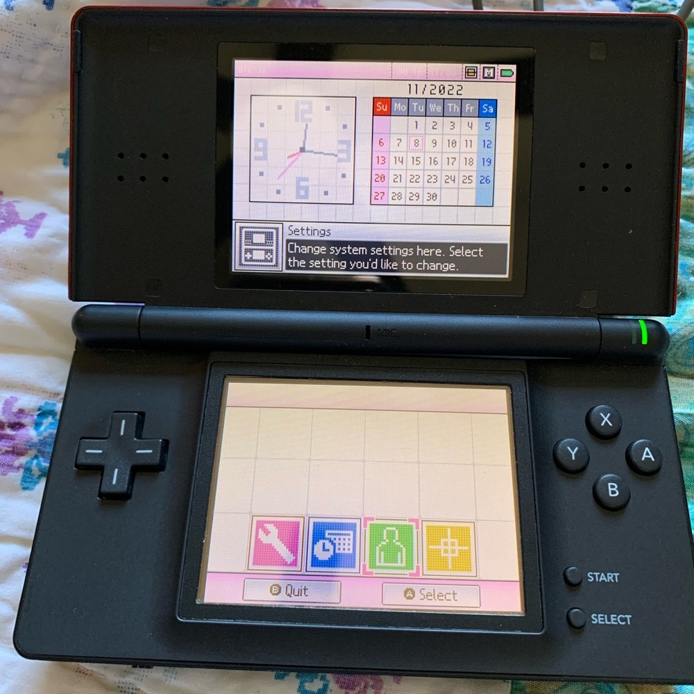 Nintendo DS Lite with games harvest moon Pokémon super Mario world